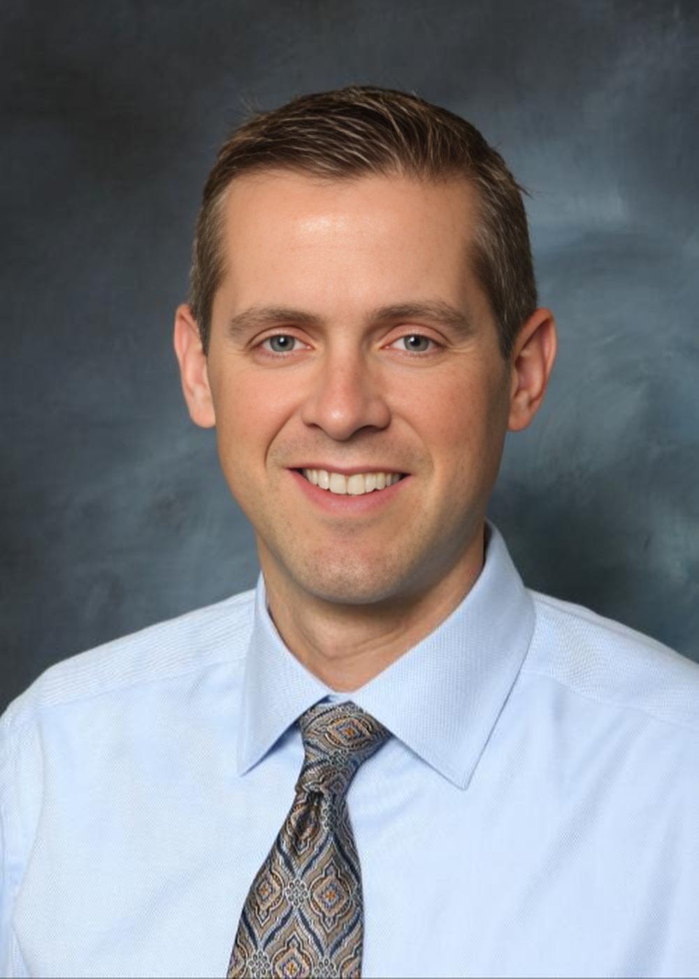 Dr. Allen M. Doezie,