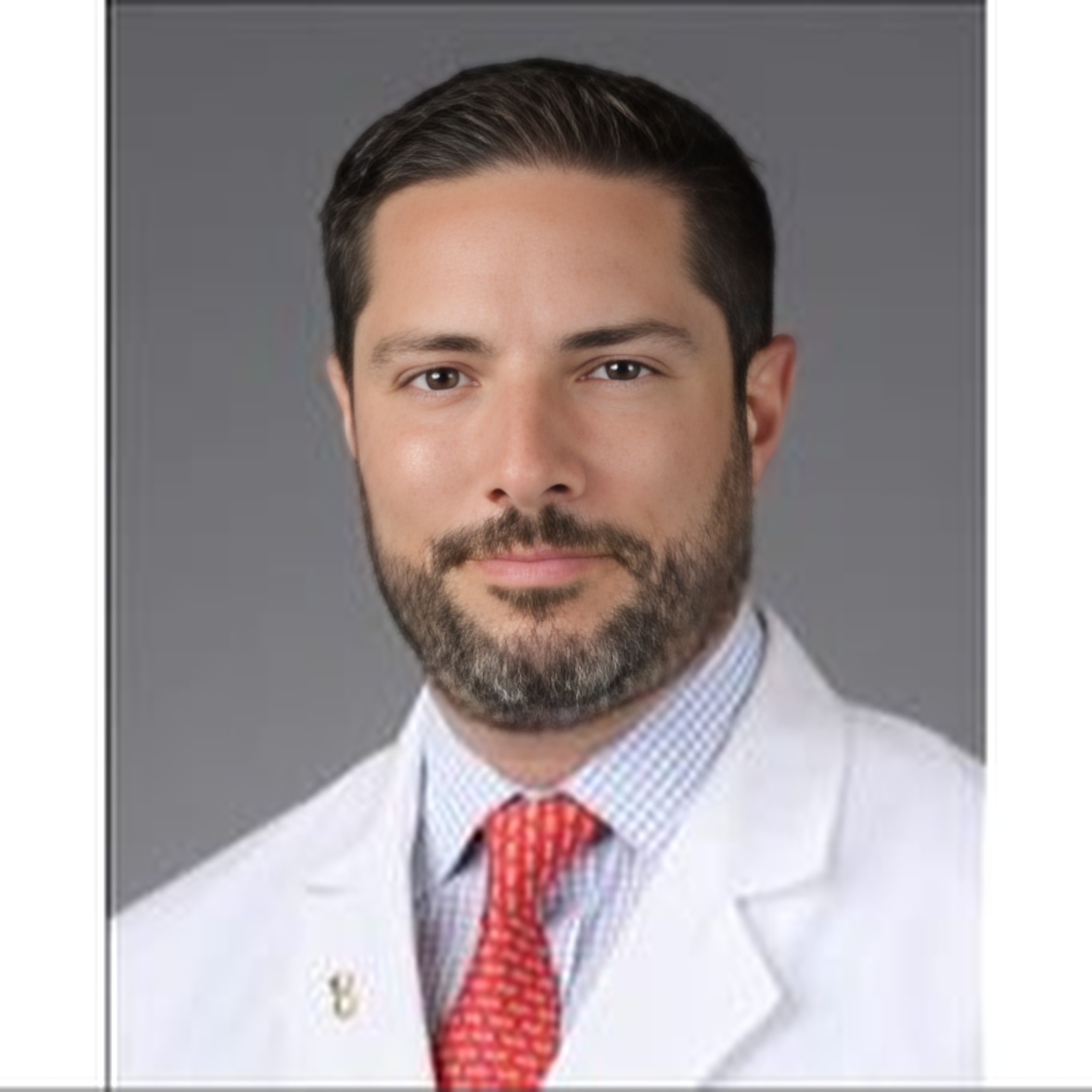 Dr. Enrique L. Gomez,
