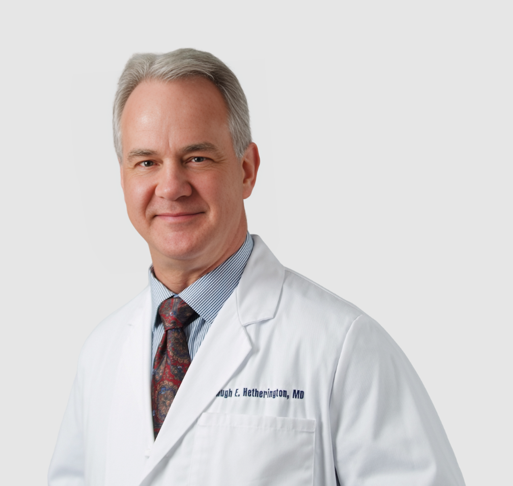 Dr. Hugh Hetherington,