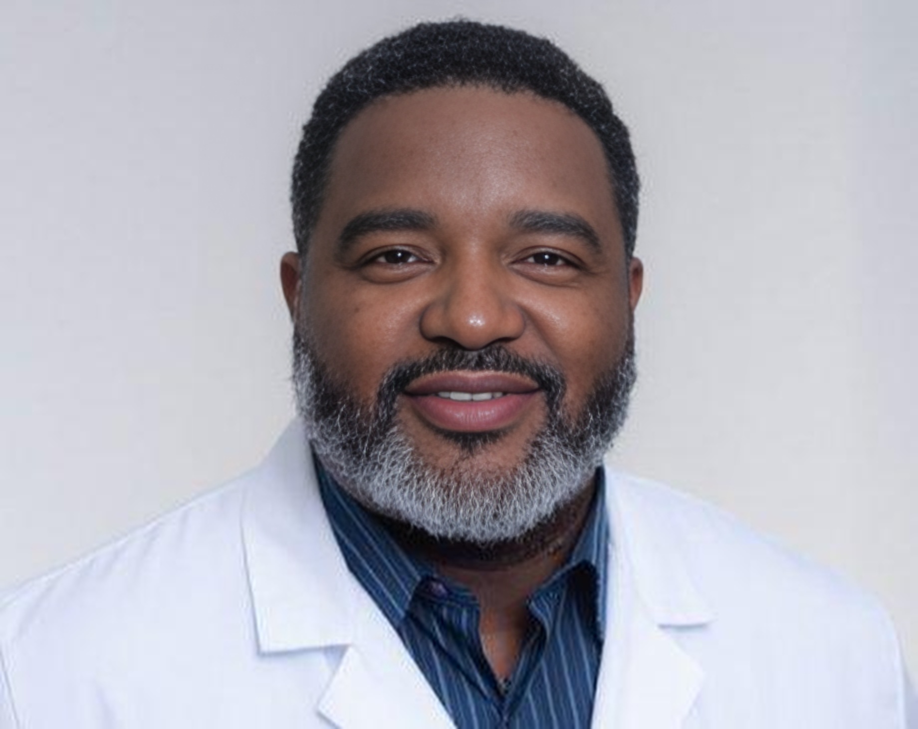 Dr. Hughan Frederick,