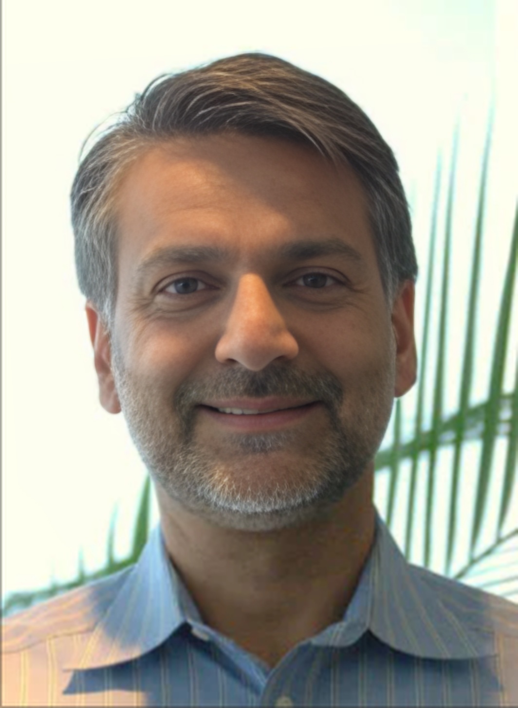 Dr. Jemshed A. Khan,