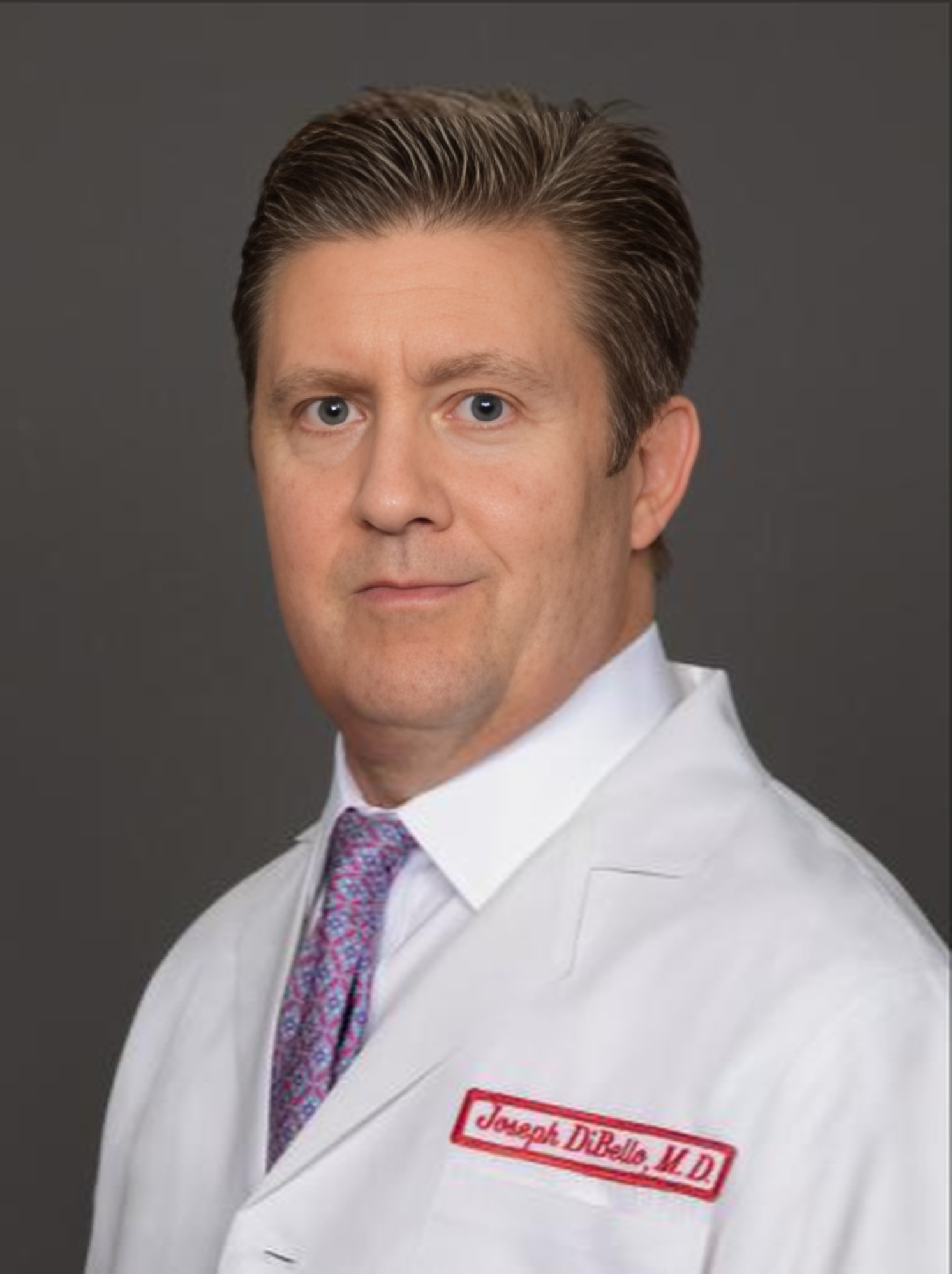 Dr. Joseph DiBello, Jr.,