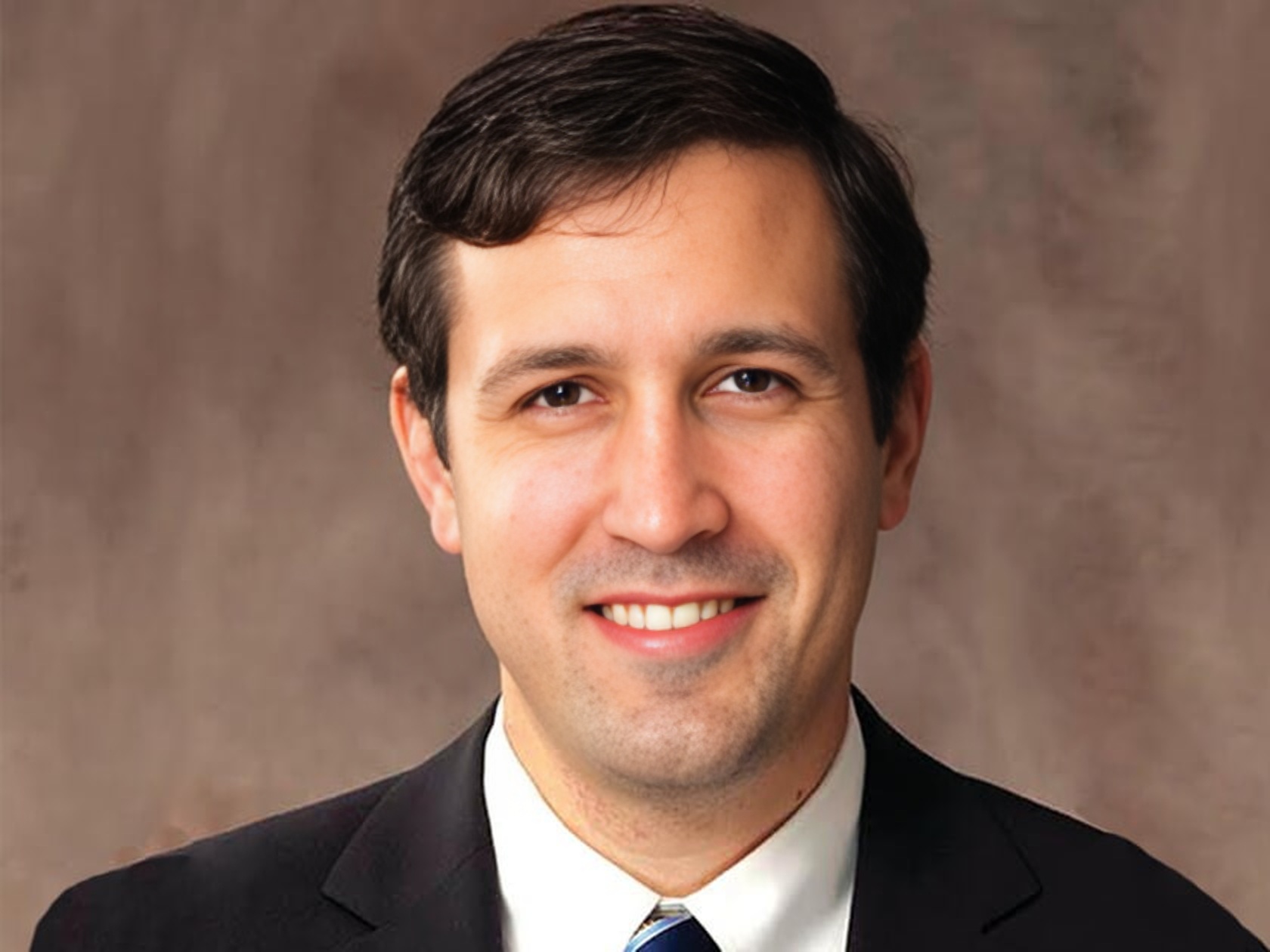 Dr. Justin P. Martin,