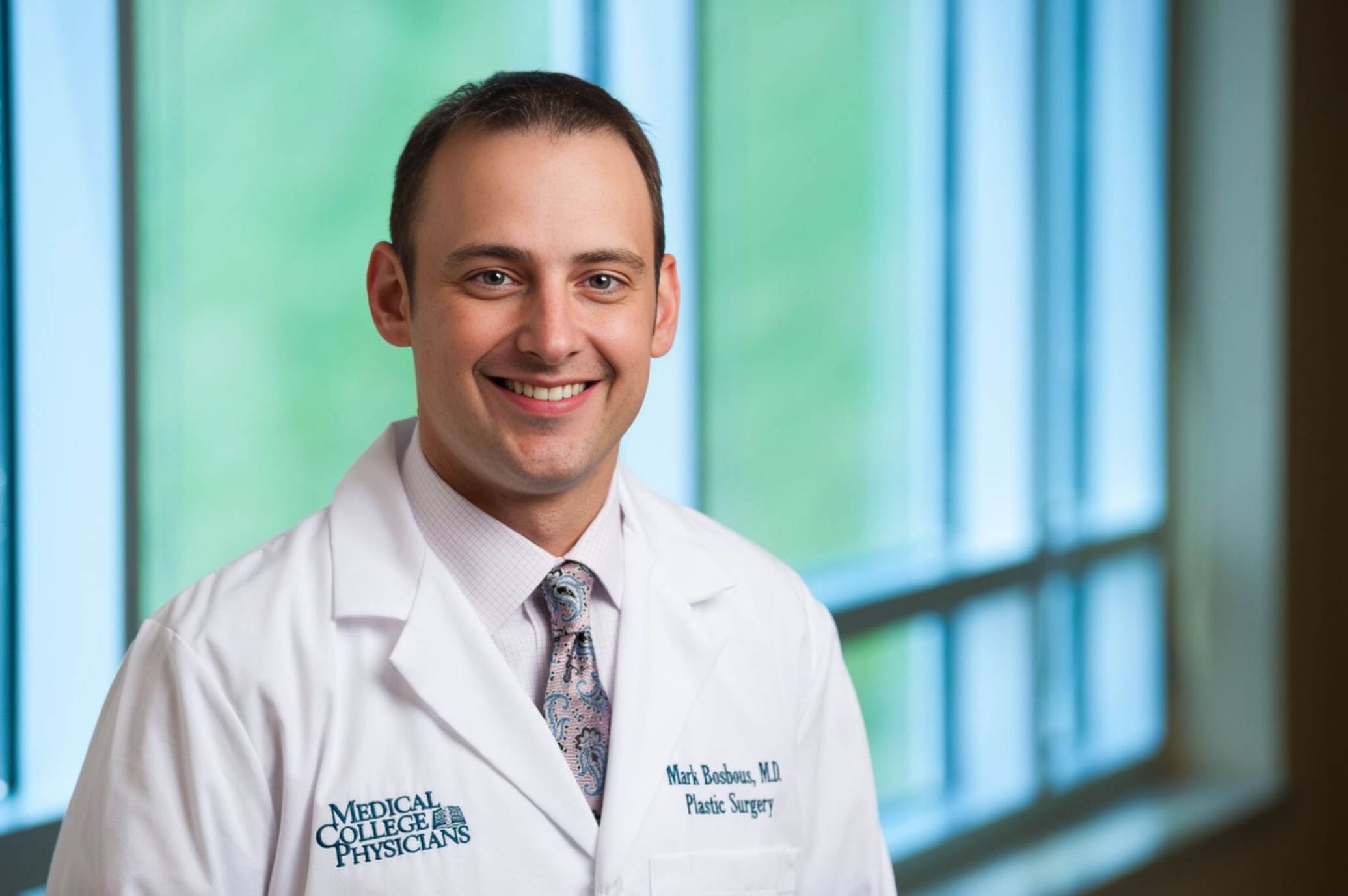 Dr. Mark W. Bosbous,