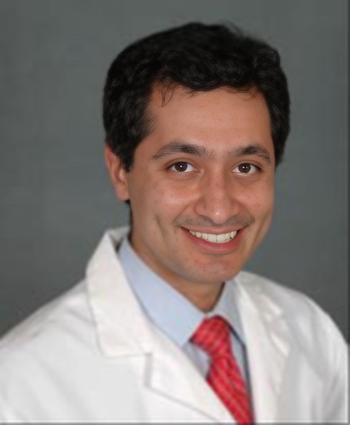 Dr. Reza Momeni,
