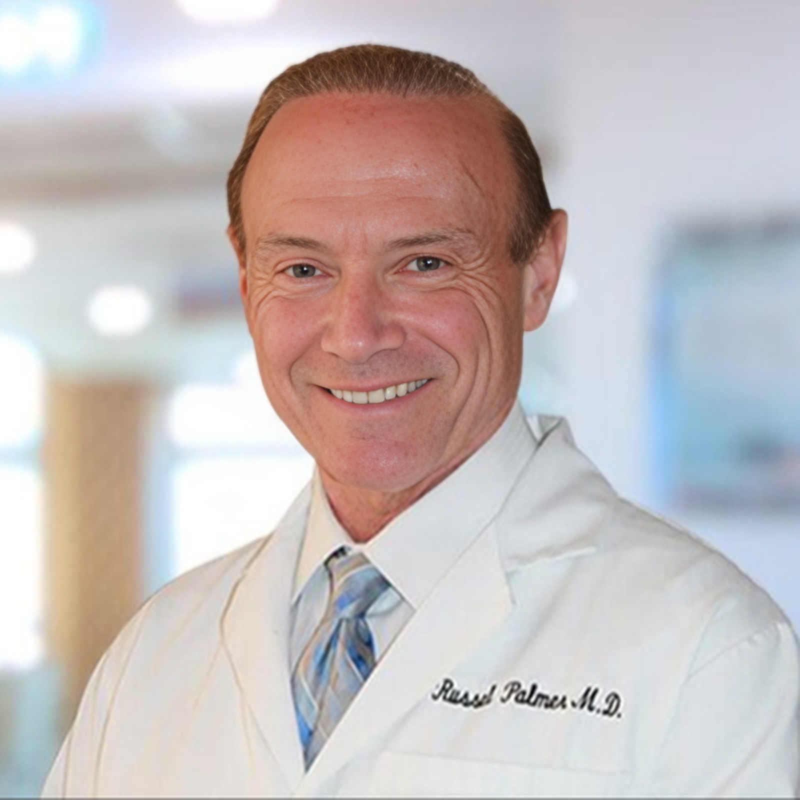 Dr. Russel S. Palmer,