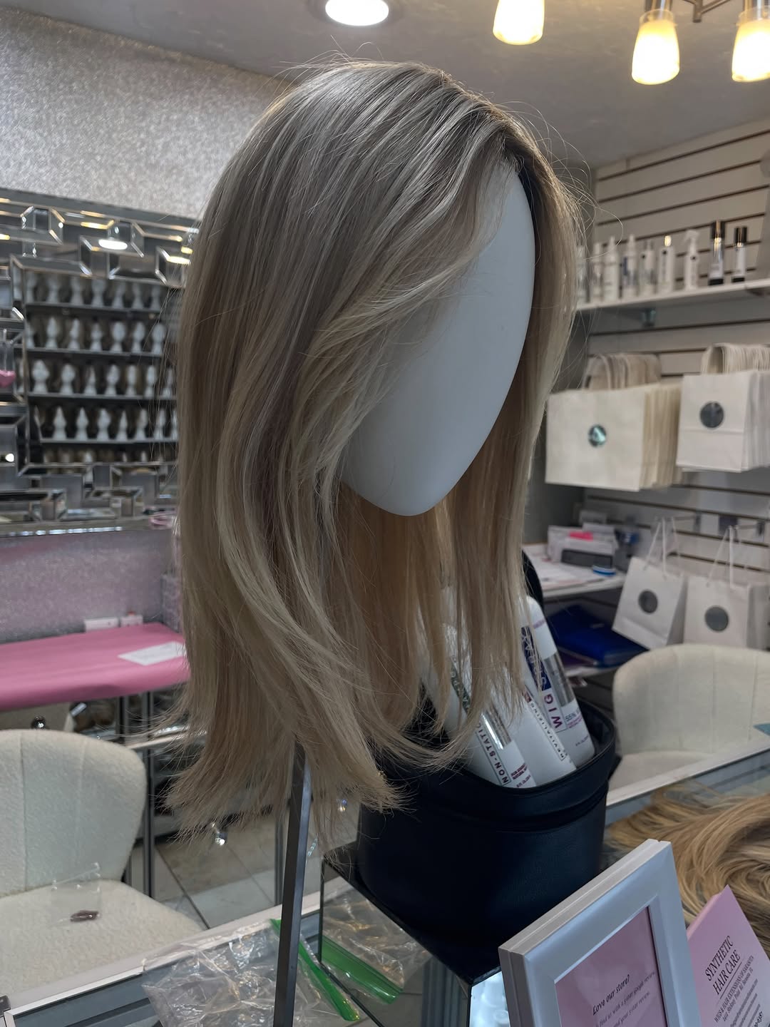 Instagram post by Dr. Adam S. Greenberg: Make an appointment and stop by to see the endless opportunities we have for all your hair needs!🥰 941-600-6387