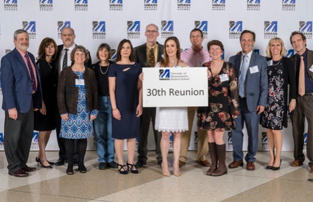 Instagram post by Dr. Adrienne Curran: Official Medical School Reunion photo. Look at who got to hold the sign