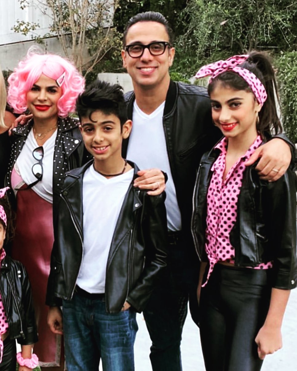 Instagram post by Dr. Amir Tahernia: Tahernia family taking it back to a little “Grease Lightning”...Hope everyone had a safe and exciting Halloween 2019. 🎃 🍭 👻