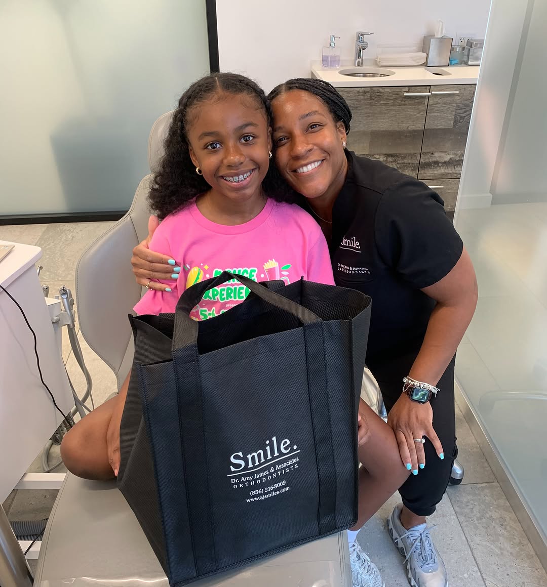Instagram post by Dr. Amy James, D: Mom by heart, ortho assistant by trade. Today she got to be both at the same time! Shalea’s daughter finally got her braces on today! 🦷 🩷�…
