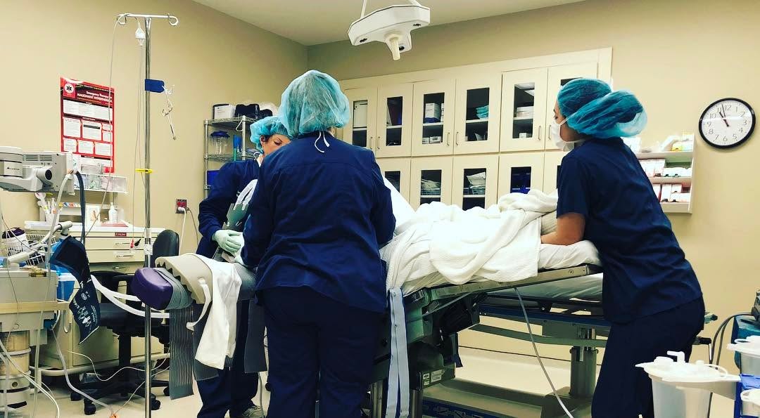 Instagram post by Dr. Andy Hand: One mommy transformation down, one to go. Another busy day with my awesome staff! #bodybyhand #drandyhand