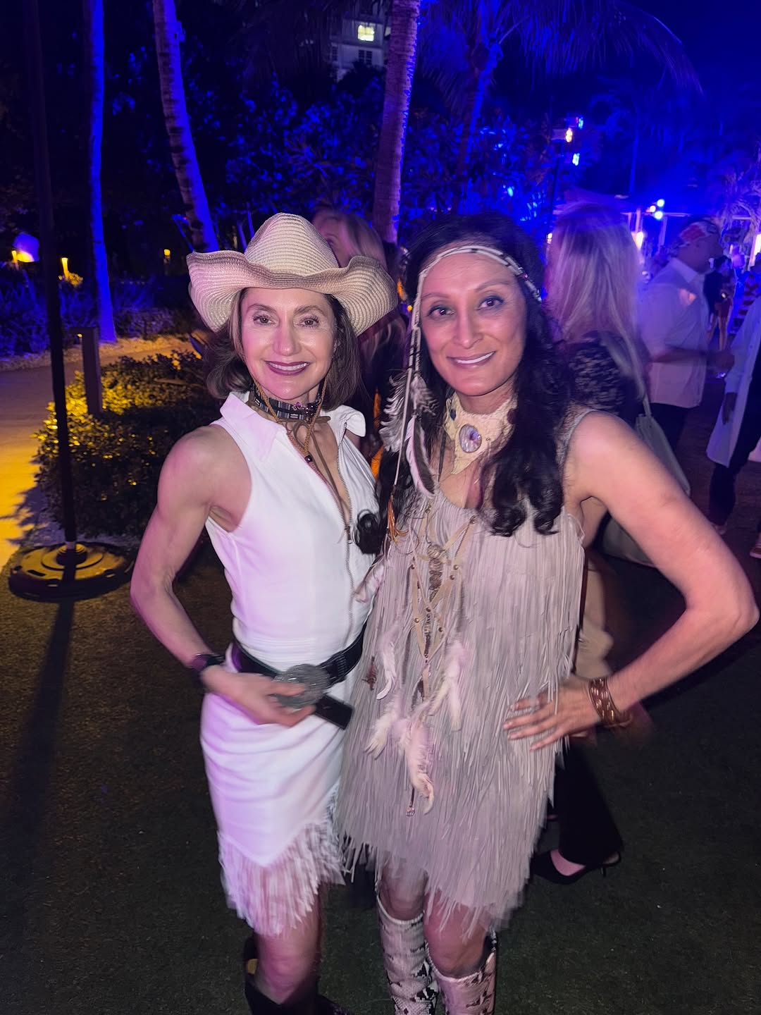 Instagram post by Dr. Anita Mandal: Great Halloween party by Galderma. 🎃👻🕸️ Can you guess who I was? Pocahontas! Styling by @oc.stylee 🤩 💫Michael Kors collection suede fri…