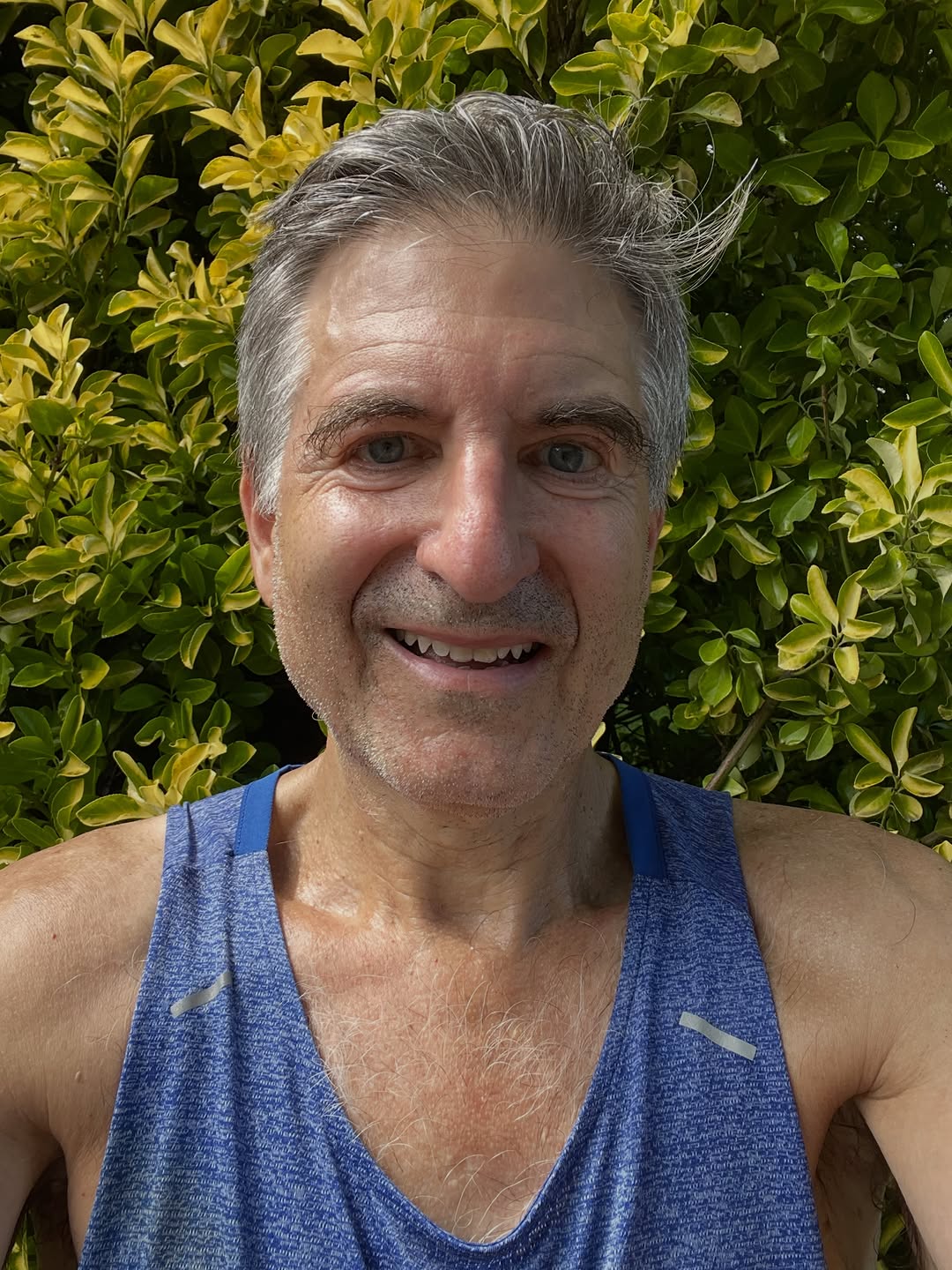 Instagram post by Dr. Arnold S. Breitbart: 20 mile run this morning in the soft summer rain, pouring rain, and clearing sky. All great. But oh how I do love the exhilaration of a run …