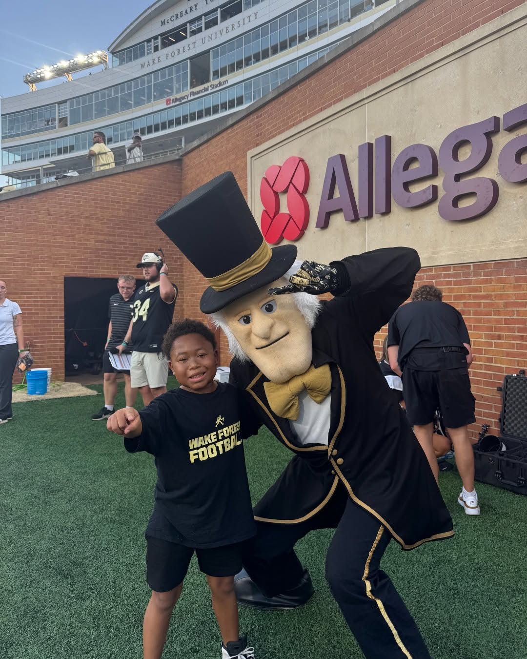 Instagram post by Dr. Brian Downs: Messiah’s love for football got a little closer to the field. 🏈 A huge football fan with an even bigger story, 9-year-old Messiah stepped o…