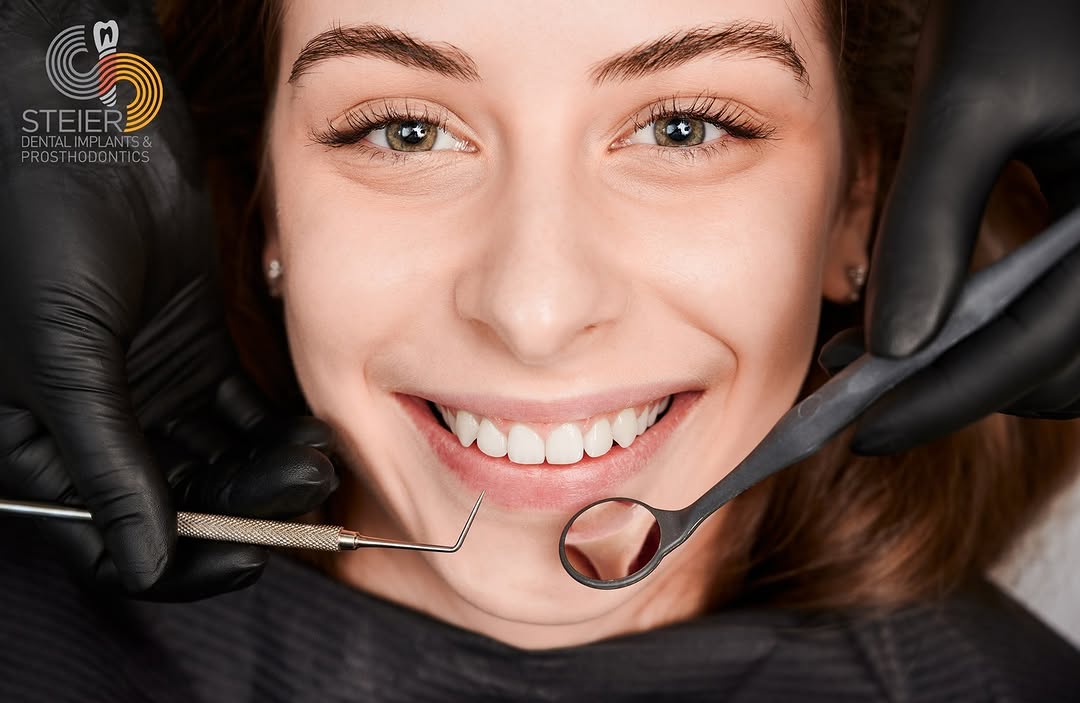 Instagram post by Dr. Carolina Steier, D: Enhance the aesthetics of your smile and improve your general oral health with Steier Dental Implants and Prosthodontics dental services. ☎️…