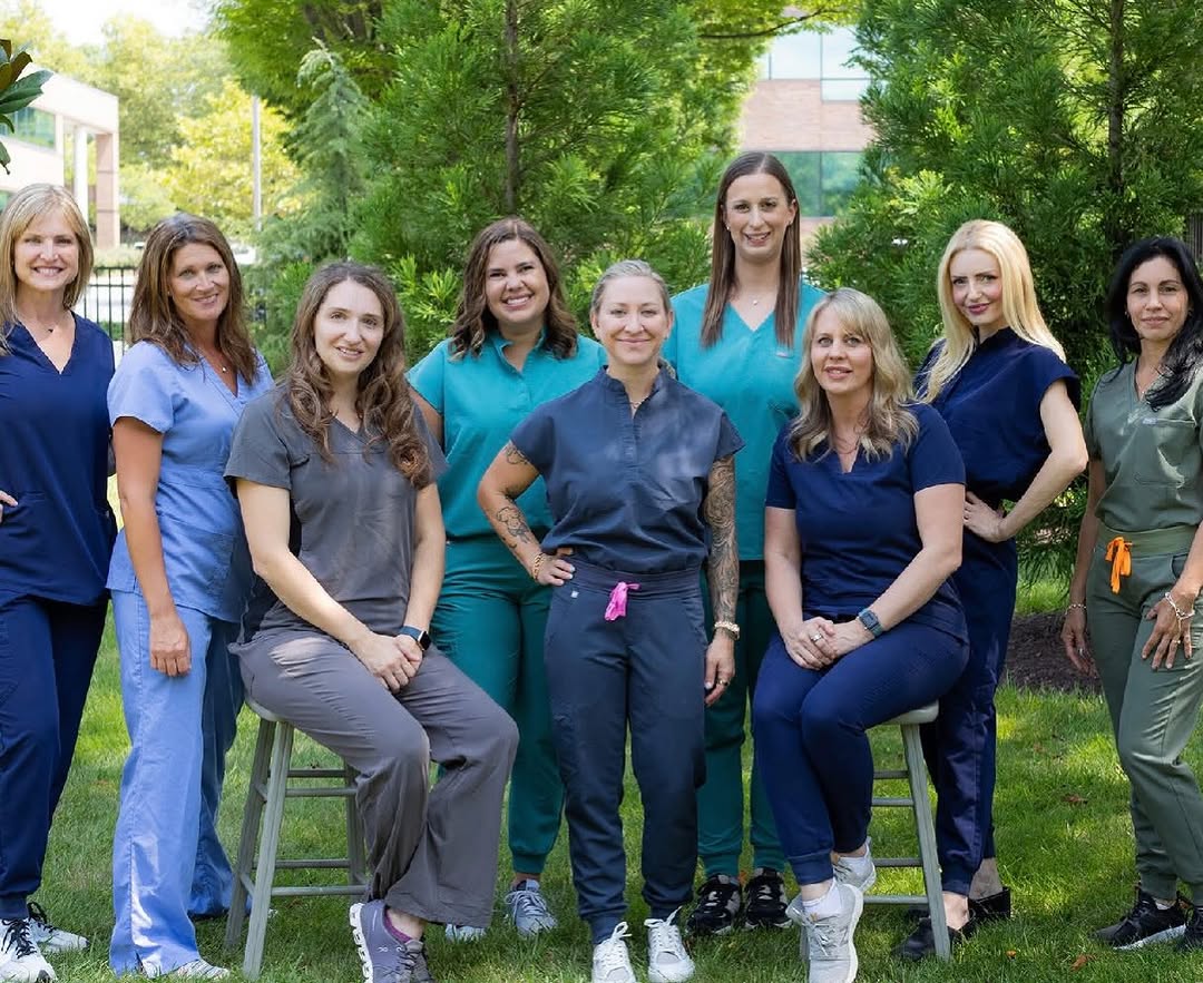 Instagram post by Dr. Carrie Houssock: Empowered women empower women. 🌸 We’re proud to support women on their journey to confidence and self-care. Happy International Women’s Day…