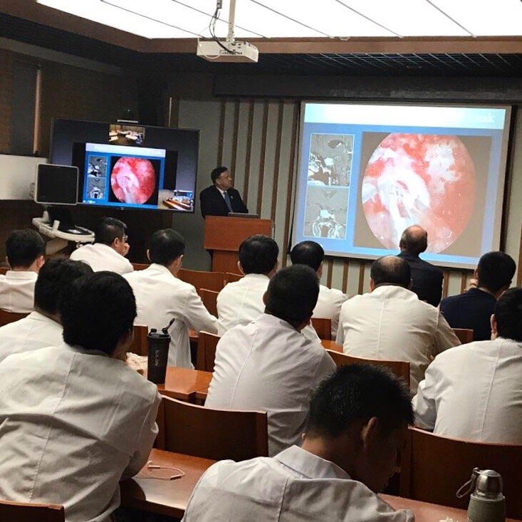 Instagram post by Dr. Chester F. Griffiths: Lecturing at Fudan University's Department of Neurology in Shanghai on an Endonasal skull base surgical approach for the removal of skull ba…