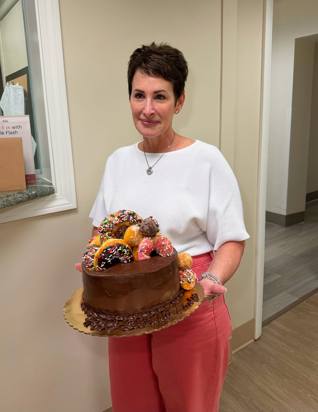 Instagram post by Dr. Christopher J. Davidson: Birthday Botox & donut cake for our birthday girl! So grateful for everything Cindy does and all the laughs she brings to the office. Happy …