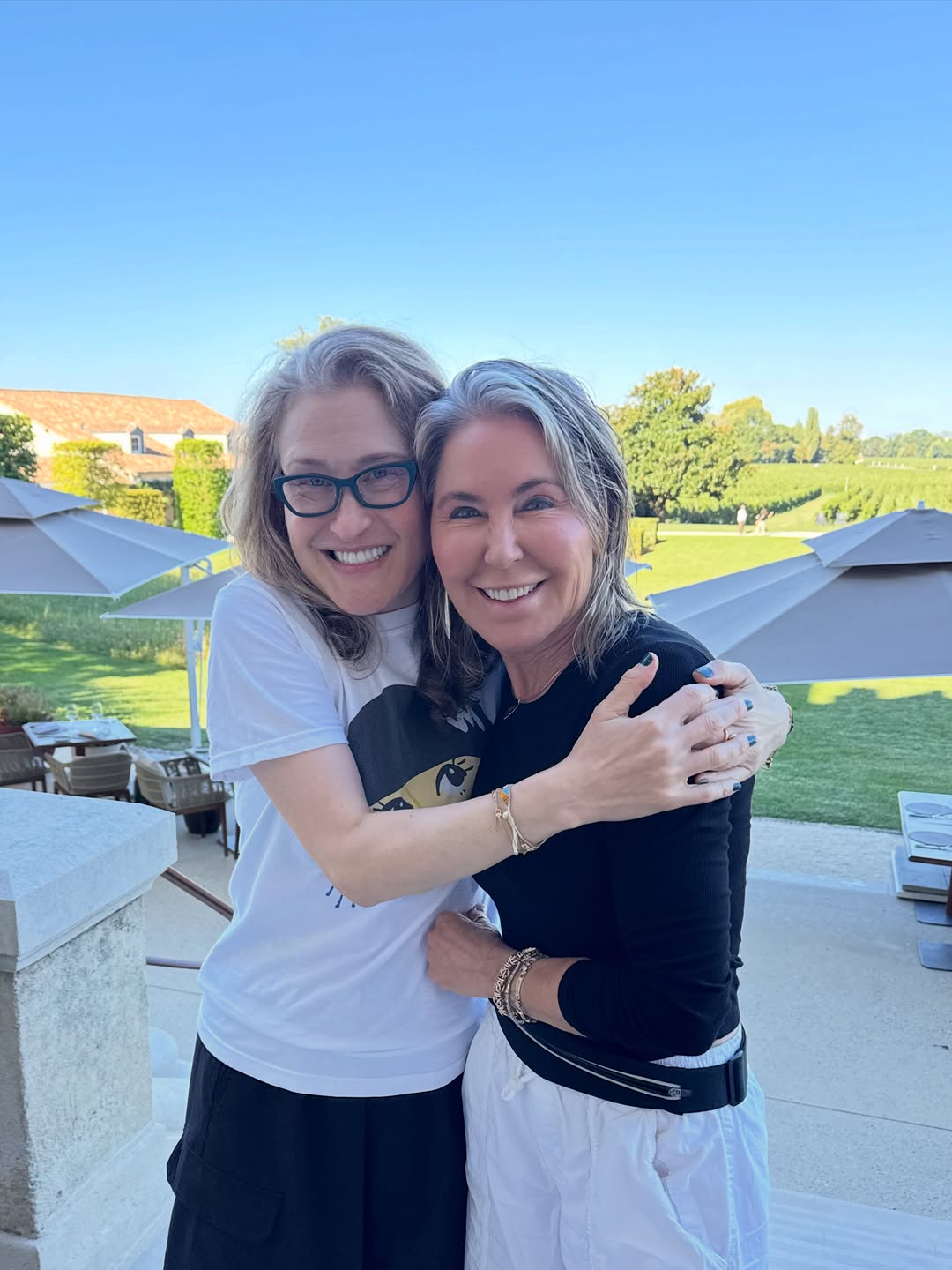 Instagram post by Dr. Cyndi Yag-Howard: So cool to randomly run into my rockstar Derm diva friend, Dr. Heidi Waldorf, at a beautiful chateau in St. Émilion, France! #aadmember #asd…