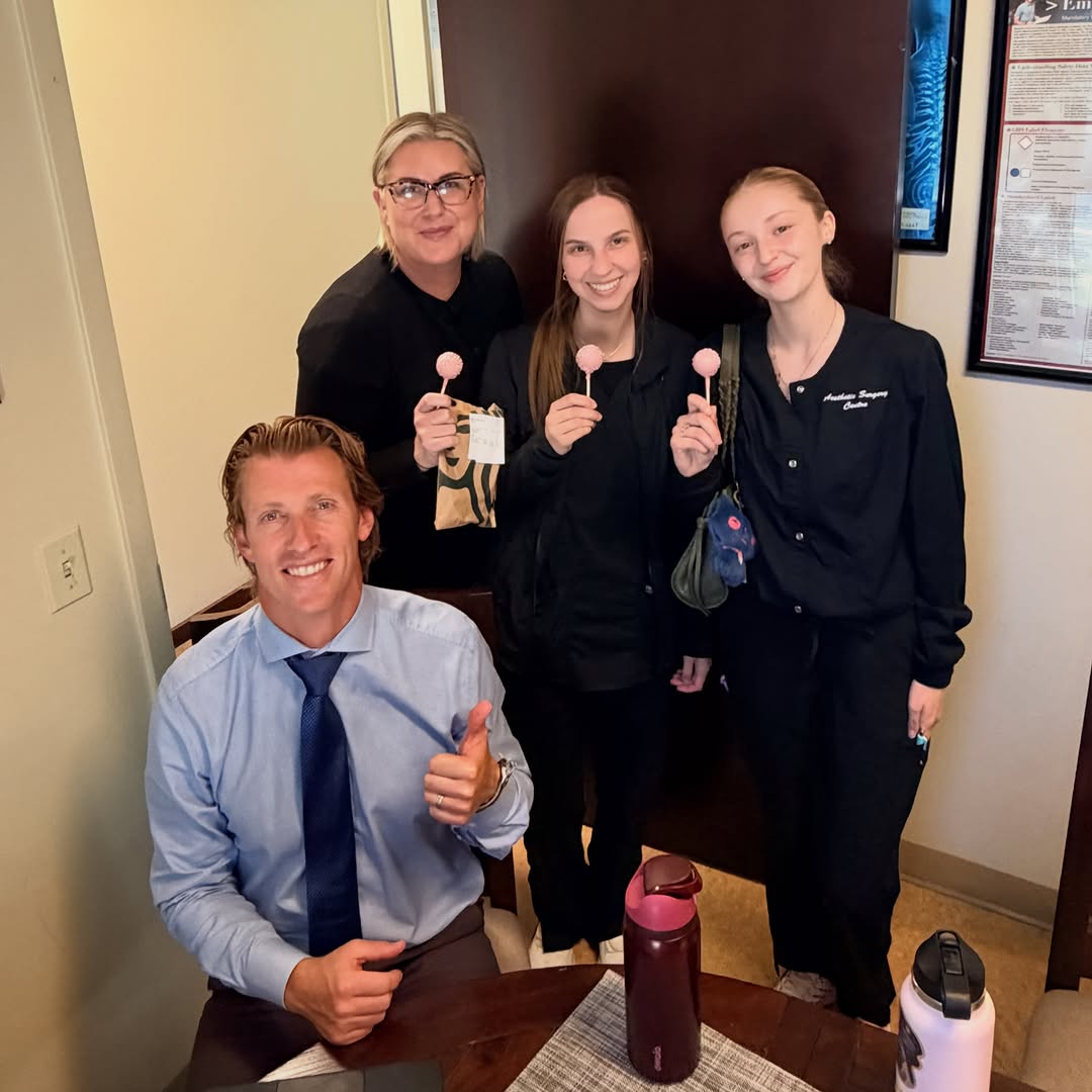 Instagram post by Dr. David V. Pratt: Dr. Perry treating his hardworking team to a little something sweet 🎂 🤍 Because a great team deserves a sweet treat!