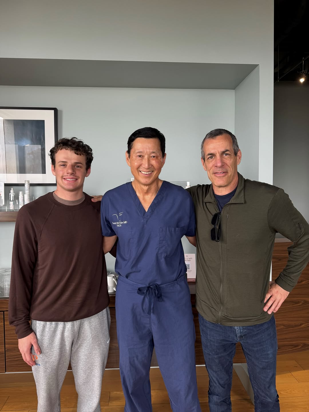 Instagram post by Dr. David W. Kim: Like father like son! Dad is 9 months post-op and son is 1 week post-op from their respective hybrid rhinoplasties. The apple apparently doe…