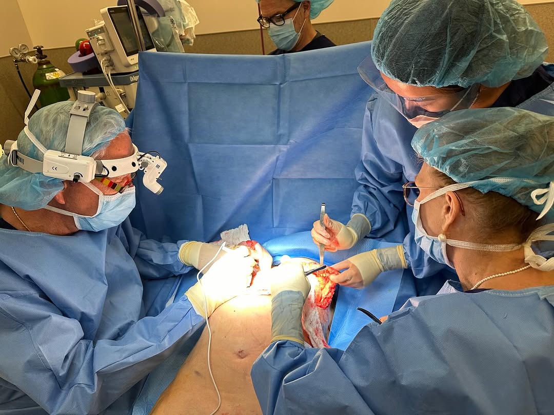 Instagram post by Dr. Deborah Ekstrom: Teamwork makes the dream work! Pictured is Dr Ekstrom and Dr Bunkis performing a mastopexy (breast lift) to help make a patient feel better …