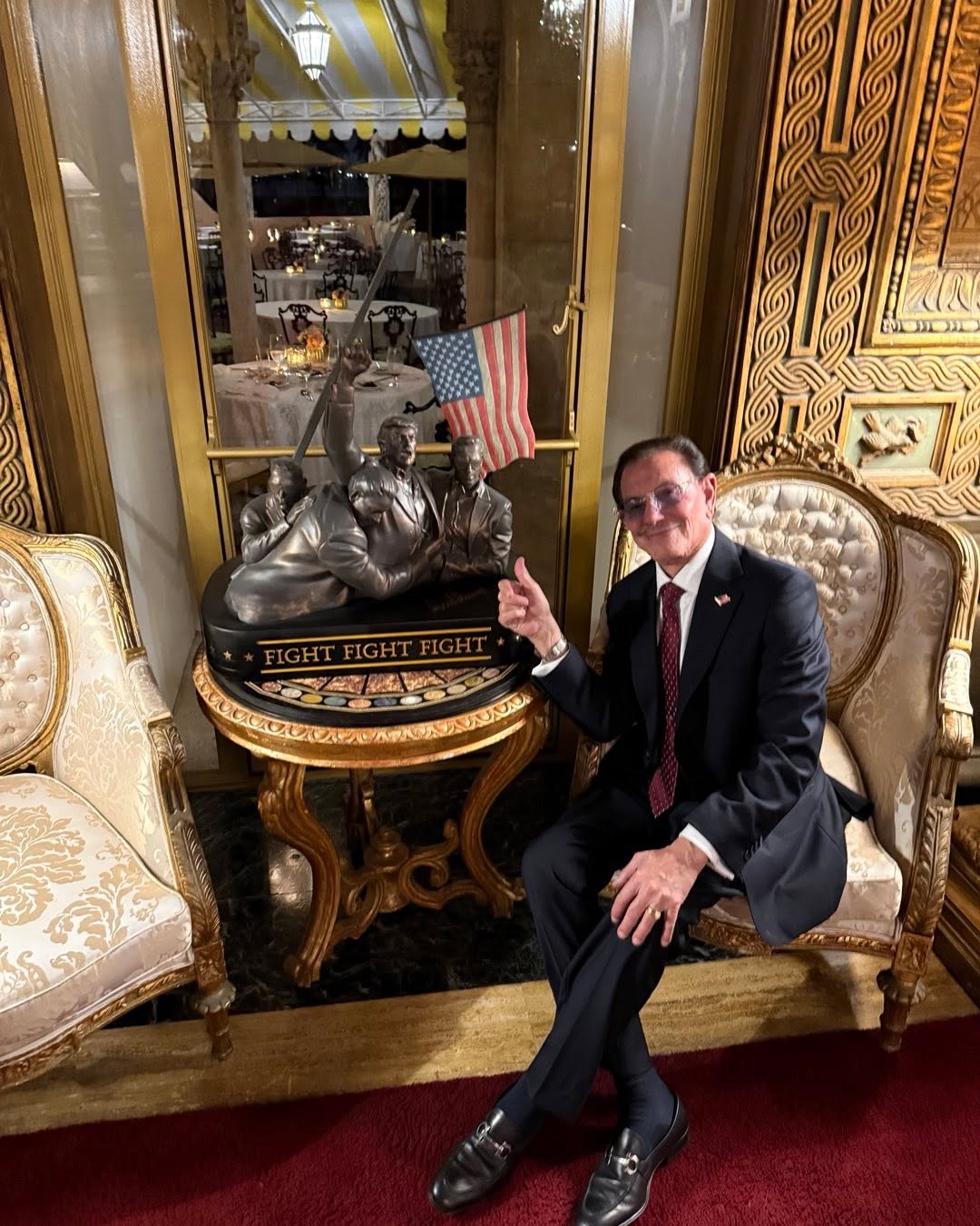 Instagram post by Dr. Enrique L. Gomez: Mar A Lago. President Trump sculpture. Fight, Fight, Fight.