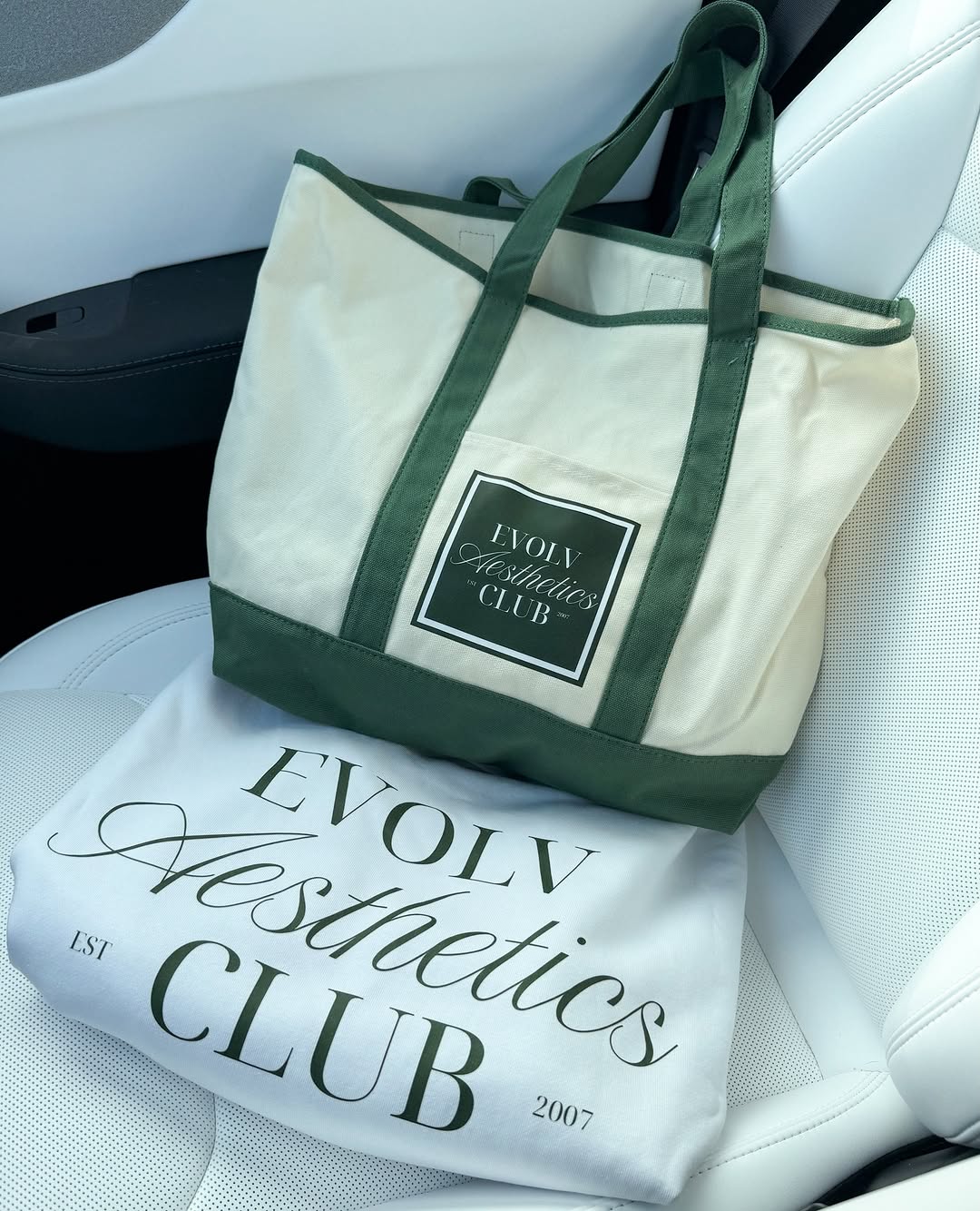 Instagram post by Dr. Frank Barone: A little EVOLV for your closet and your next appointment. 🤍 We’re giving one lucky winner an EVOLV Aesthetics Club crewneck, tote and $100 …