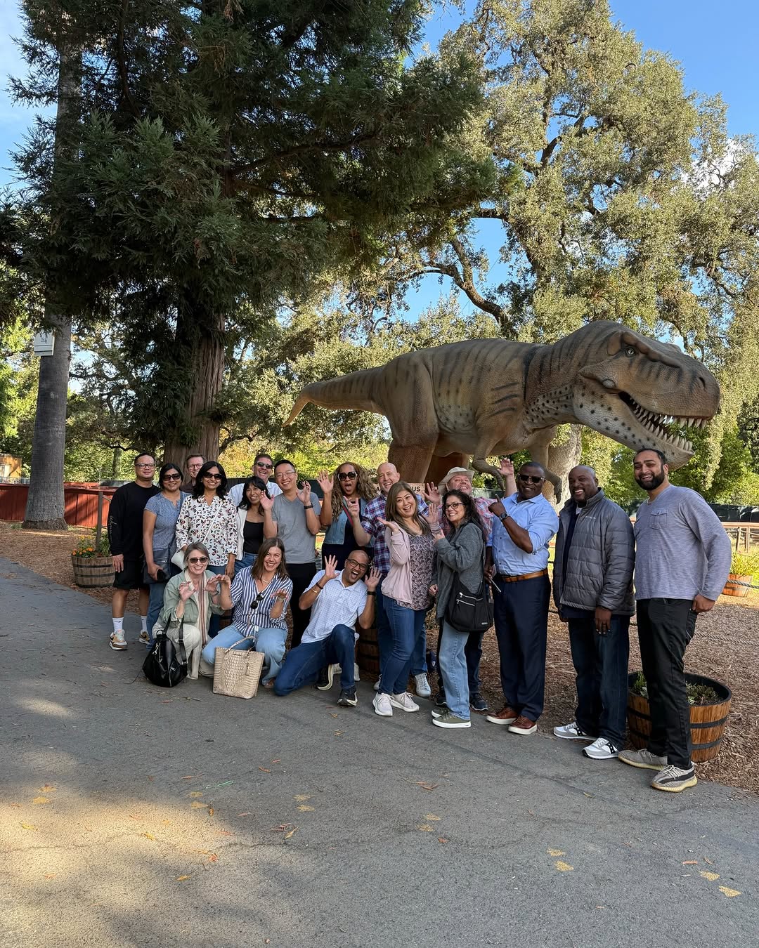 Instagram post by Dr. Gerald N. Bock: Our IT Core Applications team recently took some well-deserved time to explore the Sacramento Zoo and visit our dinosaur. Building team mora…