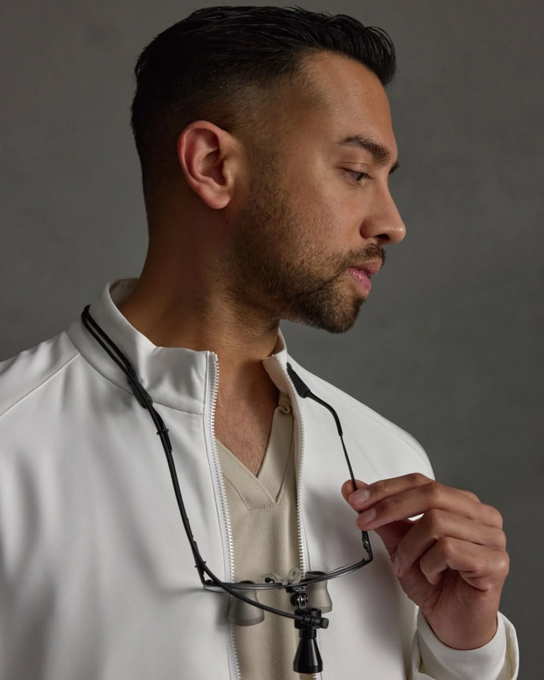 Instagram post by Dr. Giriraj K. Sharma: “Refined, polished, and neatly tailored, while maintaining the tradition of a classic white lab coat.” Dr. Giriraj Sharma, facial plastic su…