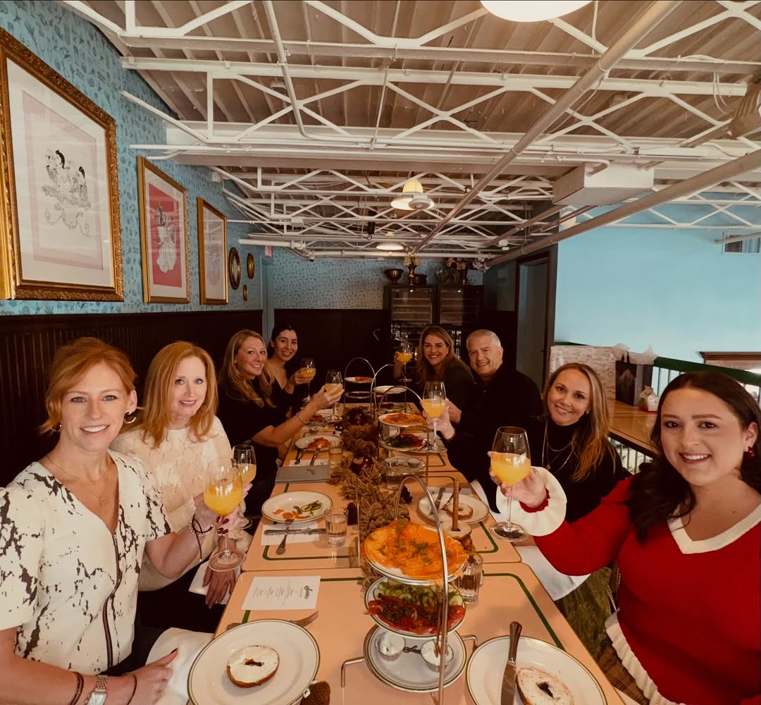 Instagram post by Dr. Graham T. Egger: Cheers and Wishing Y’All a very Merry Christmas!!💚❤️🎄 Such a fun Christmas brunch at Sadelle’s to celebrate 2025…but in particular to have…