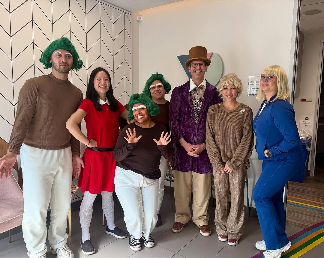 Instagram post by Dr. Gregory S. Van Dyke: Happy Halloween from Willy Wonka and the Dermatology Factory! 🧡💜🍫