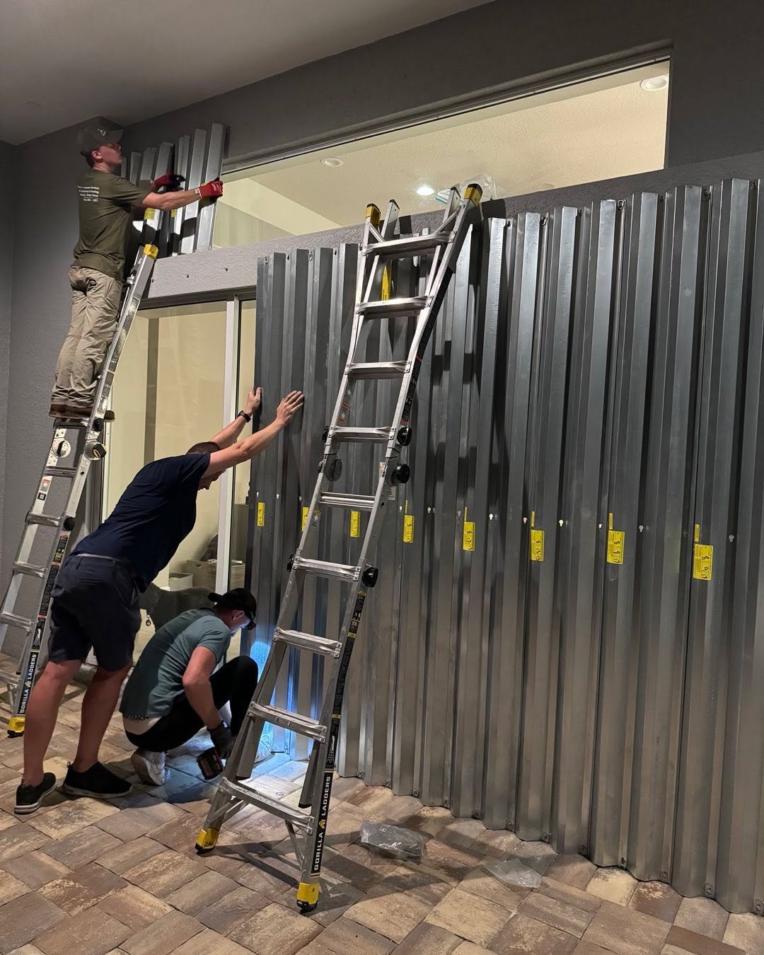 Instagram post by Dr. Harry Glassman: Preparing for Milton with hurricane shutters. Expecting winds of 180 mph.