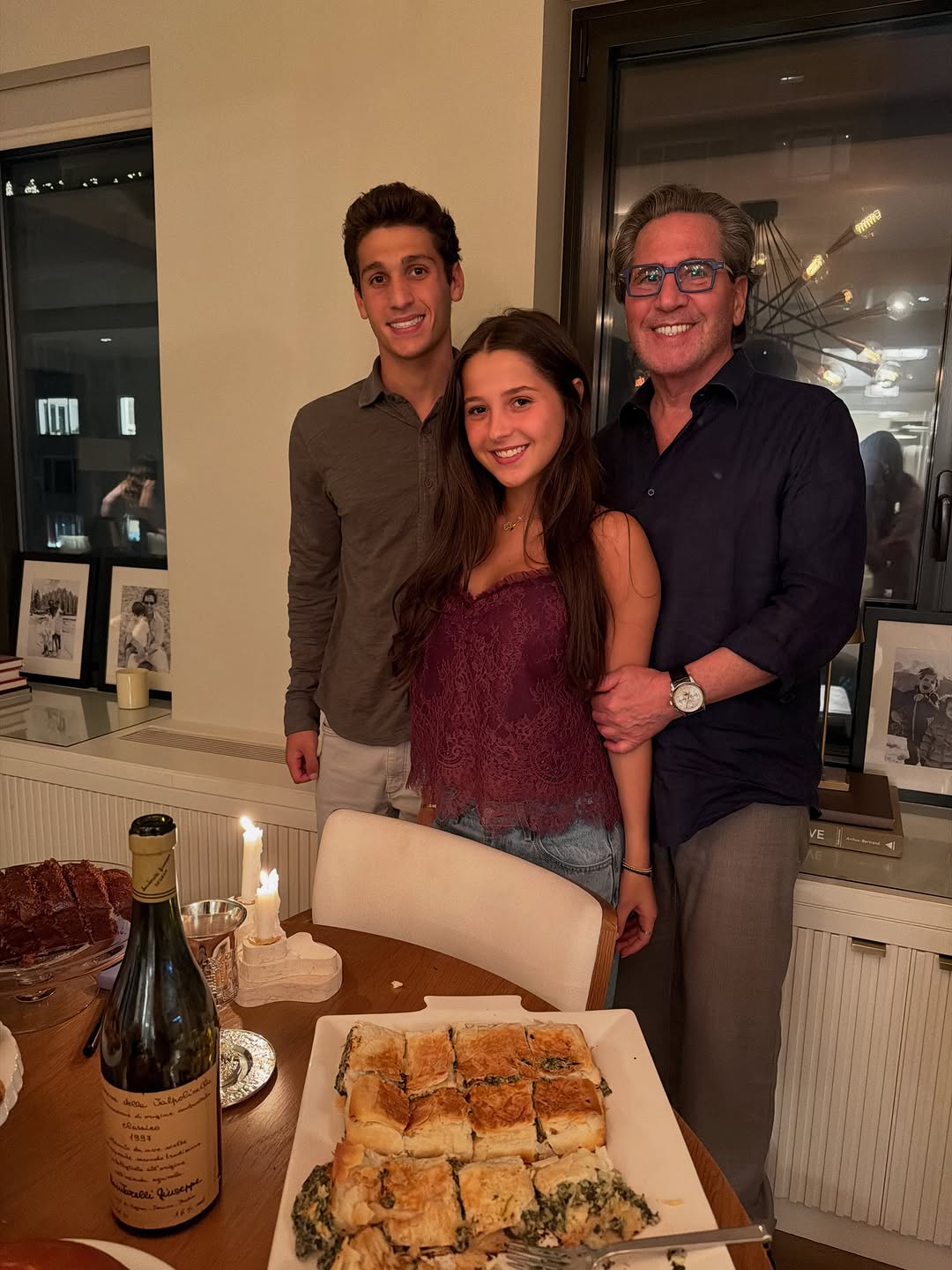 Instagram post by Dr. Howard D. Sobel: My first Rosh Hashanah in my new apartment, and I cooked everything myself! Haha. So special celebrating with Sienna and Jake, all grown up.…