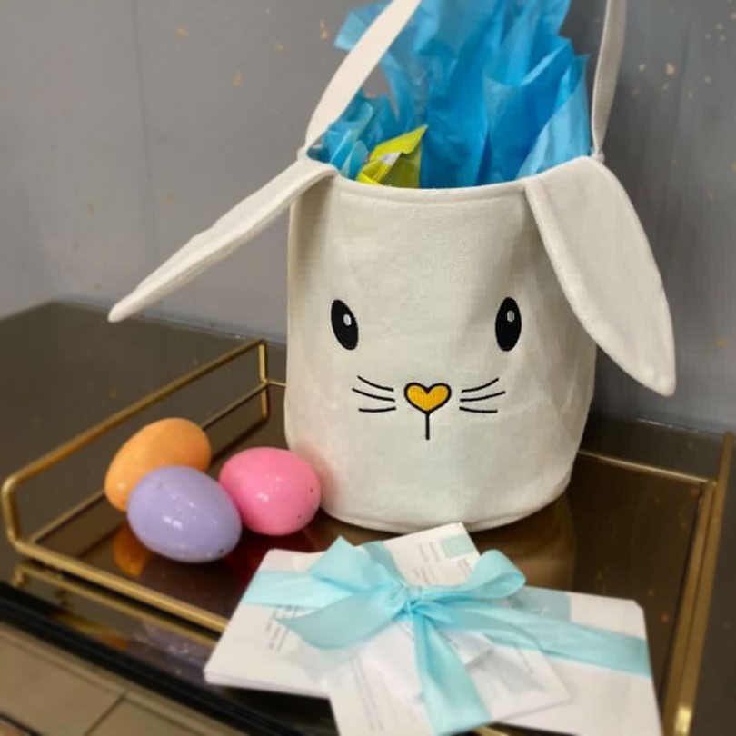 Instagram post by Dr. Inna Rostker: Happy Easter from The Dental Suite and Bella Smile! 💐🦷 #sanfranciscocosmeticdentist #sforthodontist #sfdentist