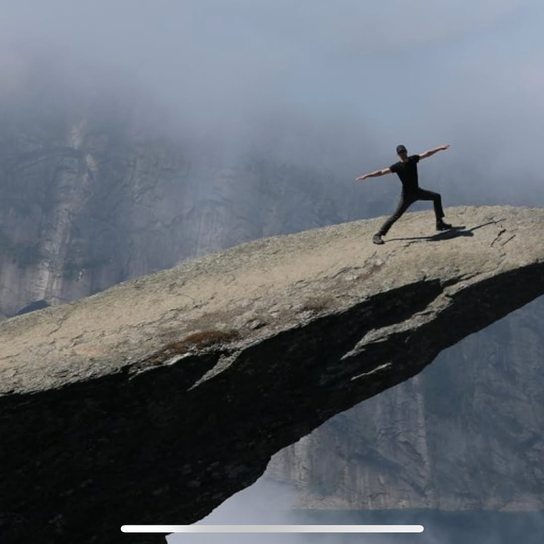 Instagram post by Dr. Jake Wardwell: Trolltunga is a rock structure in Norway that we hiked out to on our honeymoon.