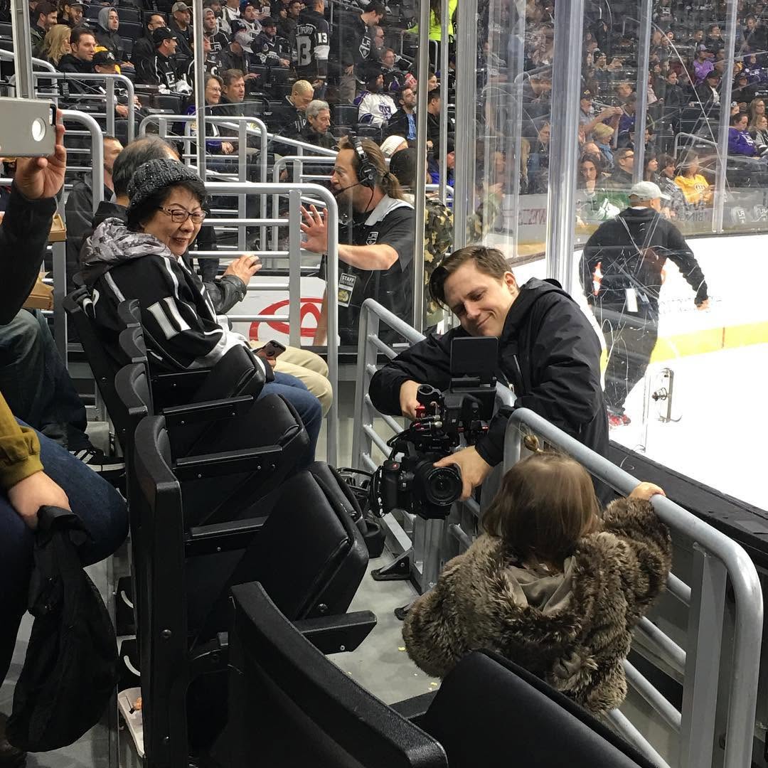 Instagram post by Dr. Jamie Lipeles: Cali Kai keeping her cool and joking around with the Papparazzi at the Go Kings Go game @staplescenterla @hermosatwins @lakings @baileylakin…