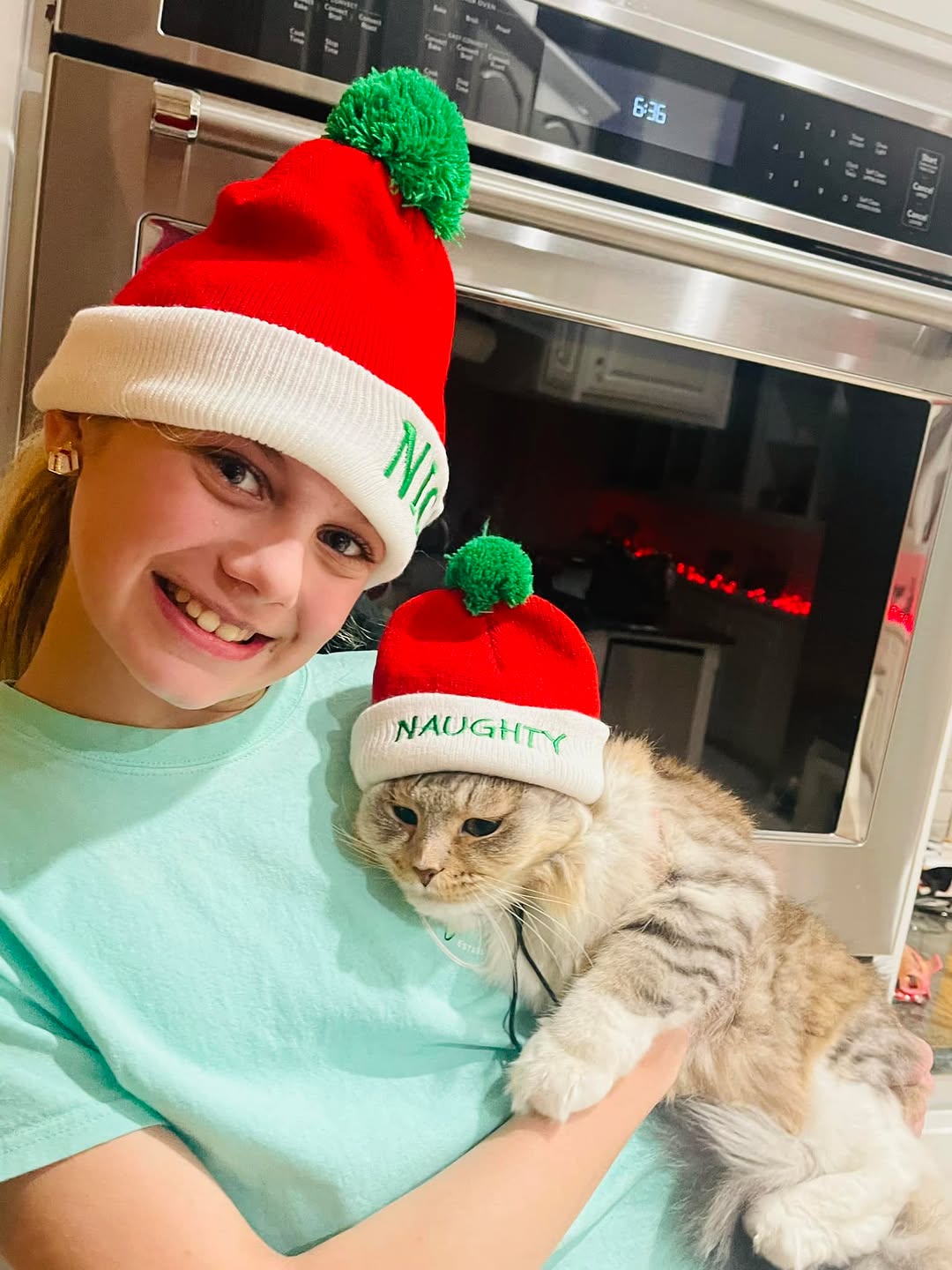 Instagram post by Dr. Jeffrey Hantes: Christmas time with my daughter and her cat Holly.