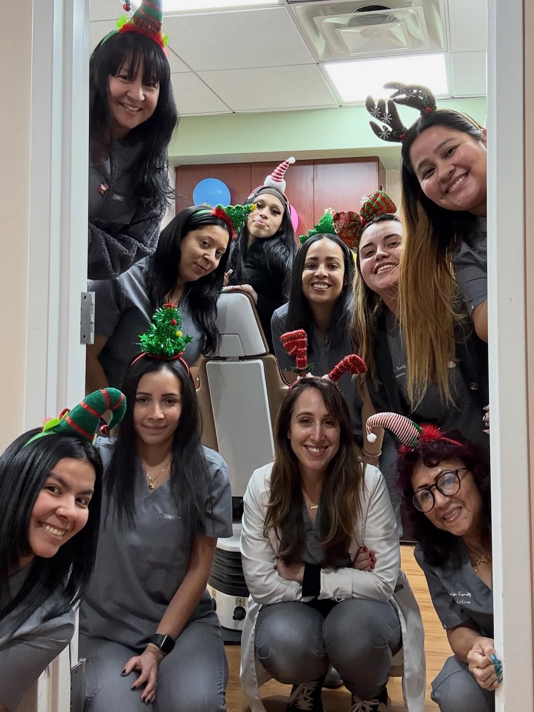 Instagram post by Dr. Jill Varriale, D: Holiday Spirit Week at Astoria Family 🎄❄️ So grateful for this incredible work family 💙 Every smile we create starts with the people behin…