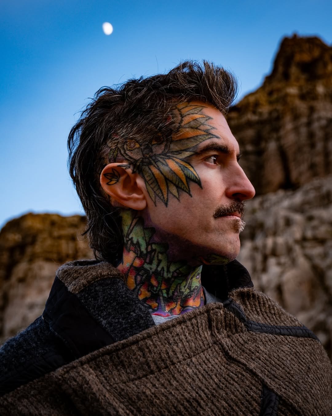 Instagram post by Dr. John Brosious: Trash and fire falling down, as we slow dance . . . . . . #tattedup #inkedup #necktattoo #facetattoo #throattattoo #tattoomodel #inkedmodel …