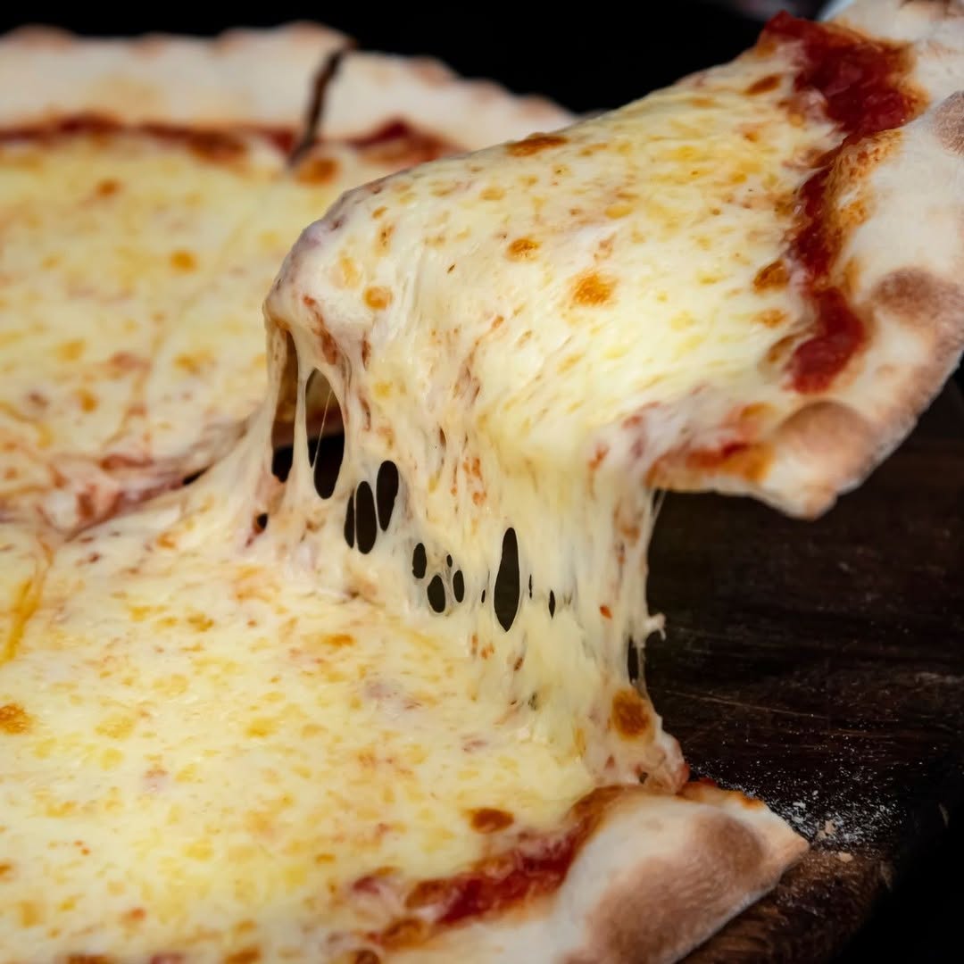 Instagram post by Dr. Joseph H. Hidalgo: Did you know cheese is a tooth-friendly pizza topping? 🧀🧀The calcium in cheese helps support strong teeth and can help balance acids in yo…
