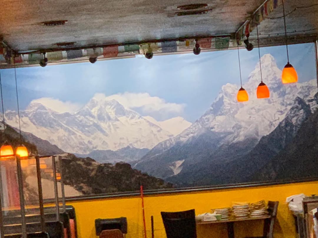 Instagram post by Dr. Kathleen Duerksen: Himalayan restaurant open! Just like Himalayan peaks now open too? Flagstaff,Azπππ