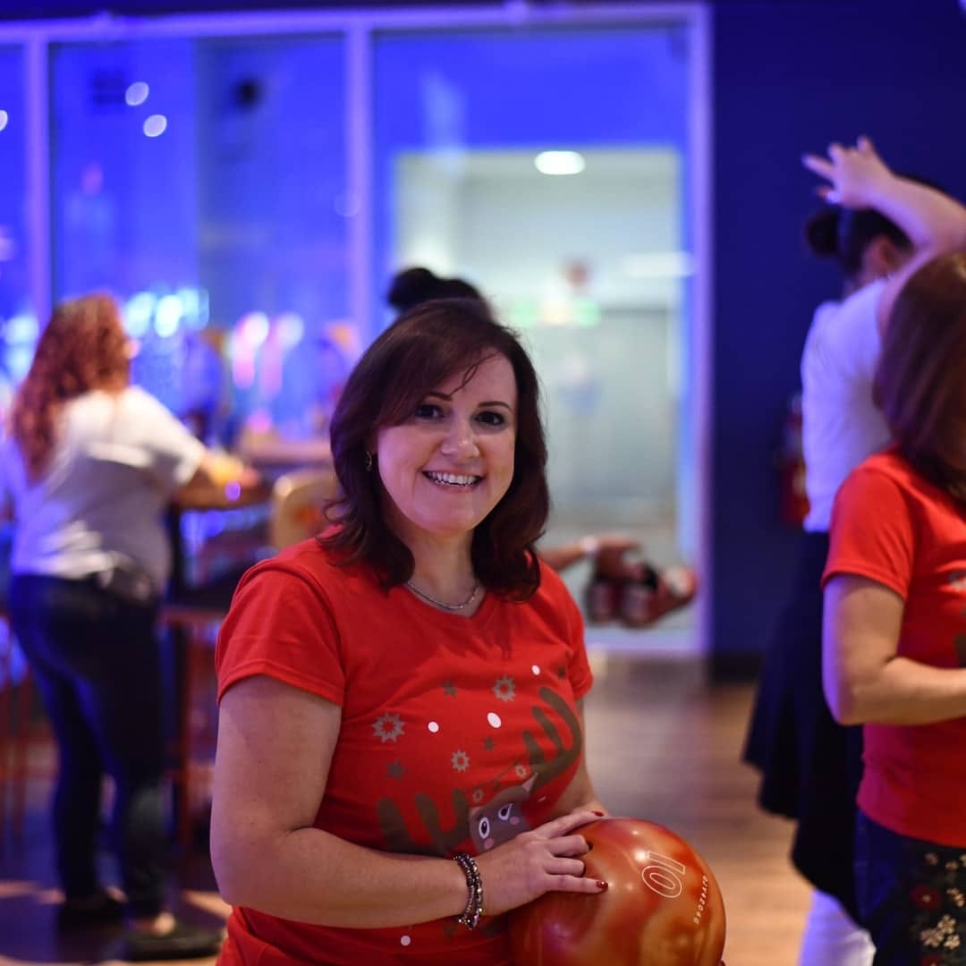 Instagram post by Dr. Kathleen W. Judge: Christmas Party! That last picture is Hanna bowling backwards.