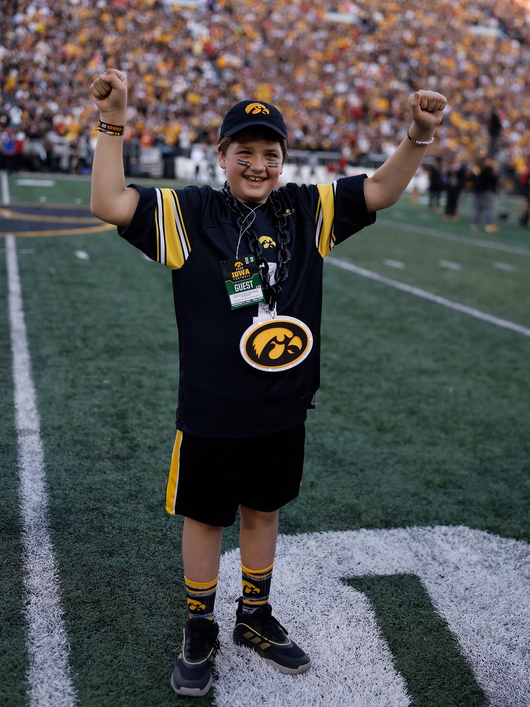 Instagram post by Dr. Keith D. Carter: HI, CHARLIE!! Our Kid Captain got the Kinnick crowd on its feet!
