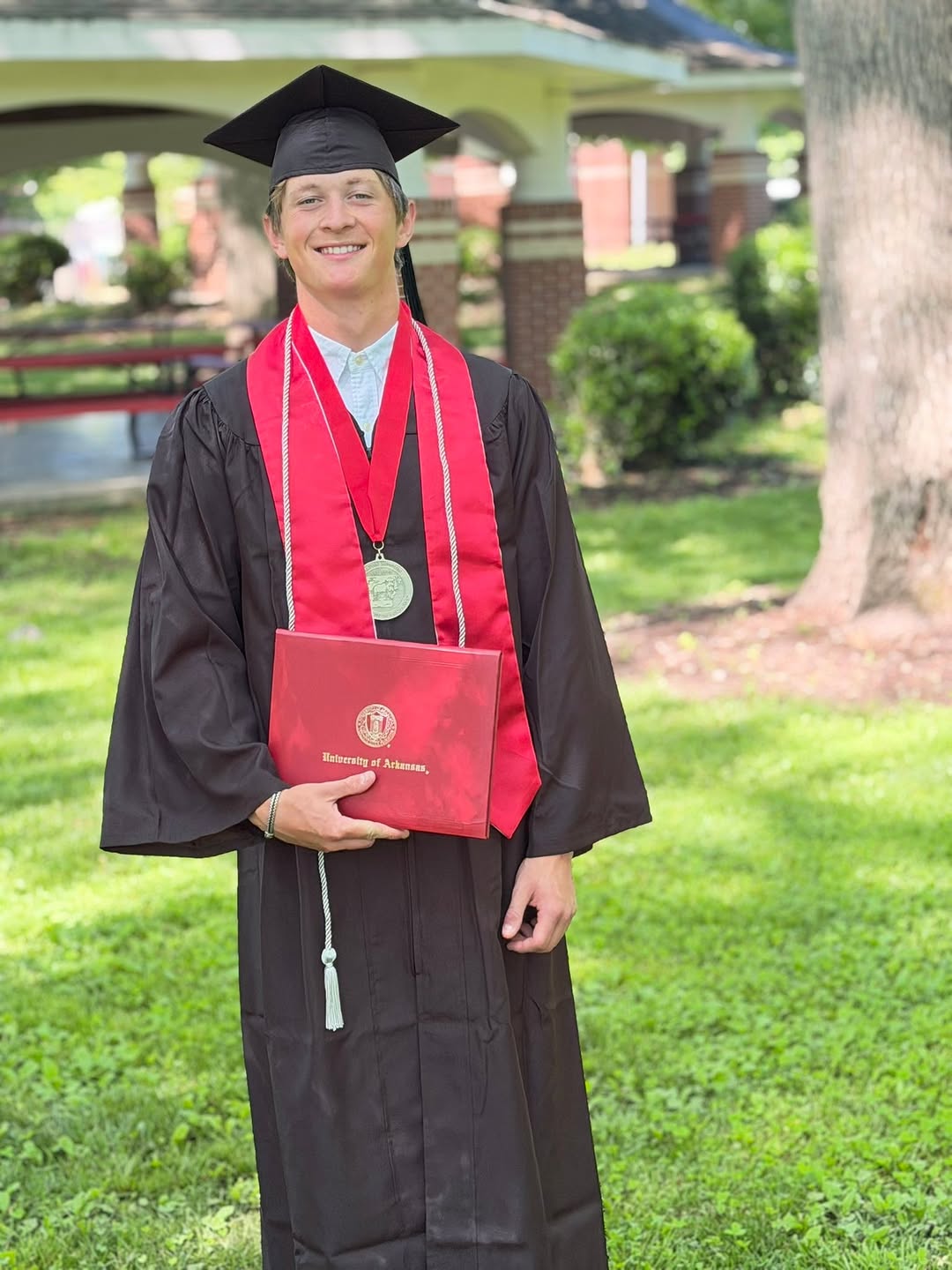 Instagram post by Dr. Ken Smart: Elliott is officially a college graduate. Not only would I like to congratulate him(obviously) on an incredible job(cum laude honors busines…