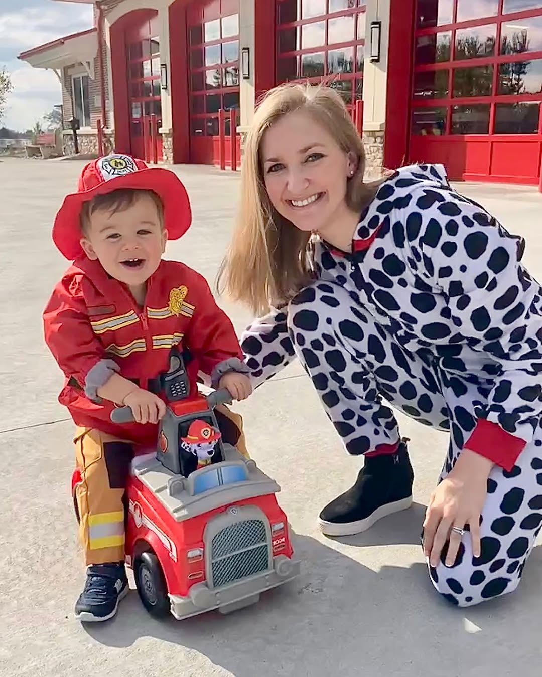 Instagram post by Dr. Laura Schilling: Hope everyone had a safe and happy Halloween weekend! 🎃🍁👻 . #trickortreat #cutefireman #puppylove #ilovefall #dermlife #momsinmedicine #w…