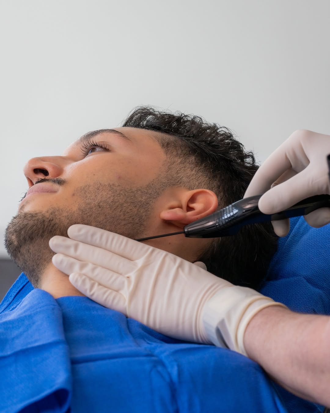 Instagram post by Dr. Lawrence Iteld: Looking for a little extra tightening and contouring without going the full surgical route? #QuantumRF uses a tiny probe and targeted RF hea…