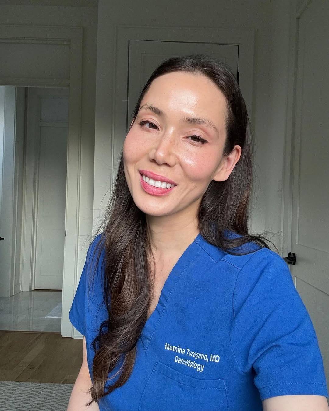 Instagram post by Dr. Mamina Turegano: If you’re new, welcome! 🫶 My name is Mamina Turegano, and l’m a triple board-certified dermatologist, internist, and dermatopathologist, wh…