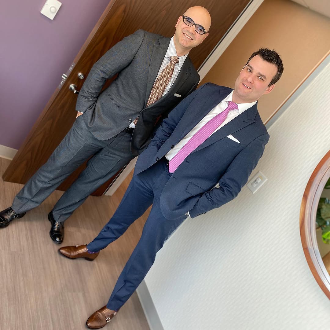 Instagram post by Dr. Marc A. Sarcia: Had a great day in clinic today! We clean up nicely if I do say so myself! @drscottreis 😎👍