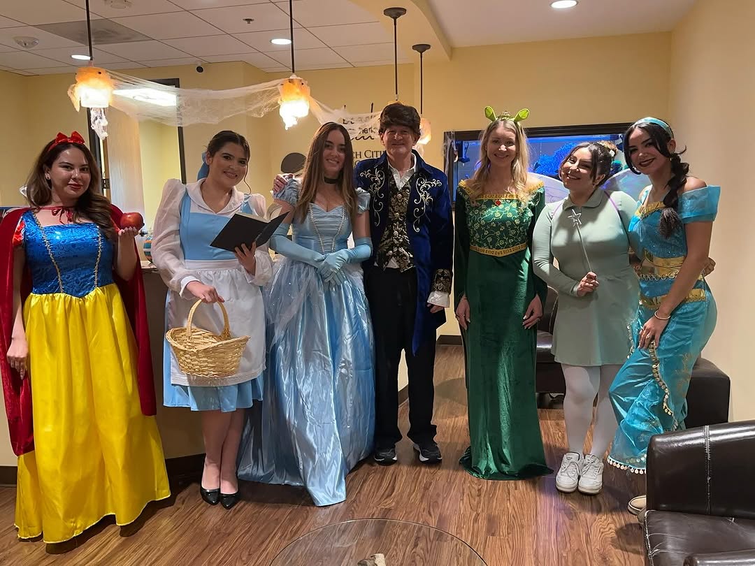 Instagram post by Dr. Mark Rayman: Happy spooky Halloween from our whole staff to you! 🎃 👻 #halloween #celebrate #best #staff #disneyprincess